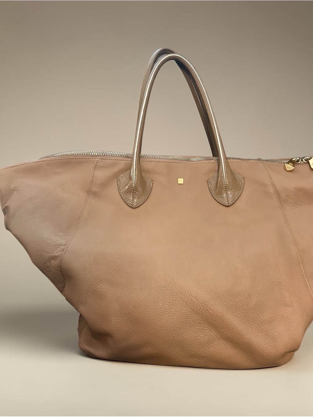 Pour La Victoire Taupe Leather Travel Tote with Gold Accents